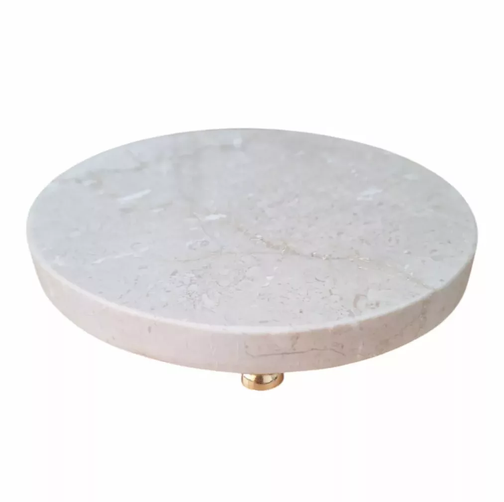 Présentoir rond en marbre blanc avec pieds dorés