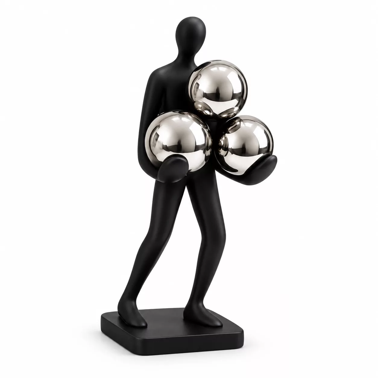 Sculpture noire aux trois sphères chromées
